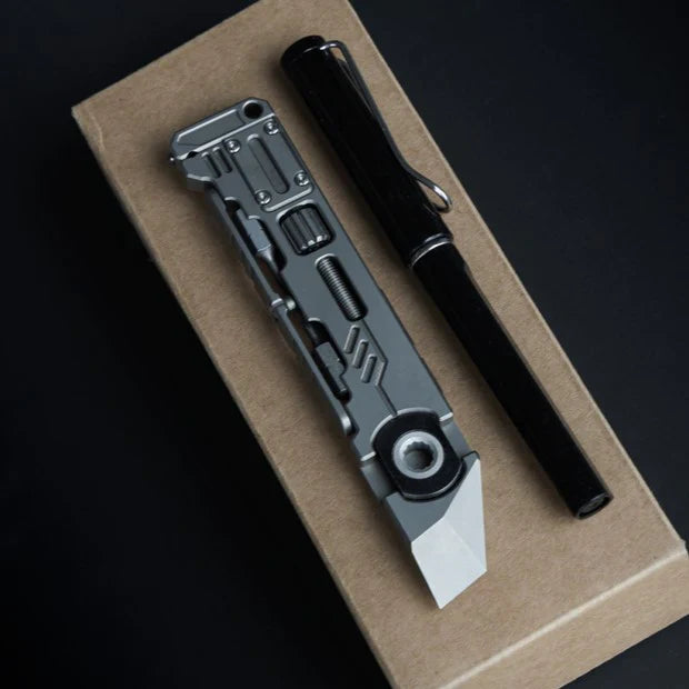 12-in-1 Titanium Multi-Function Pry Bar – Pen-Sized EDC Tool with Tritium Glow Slots