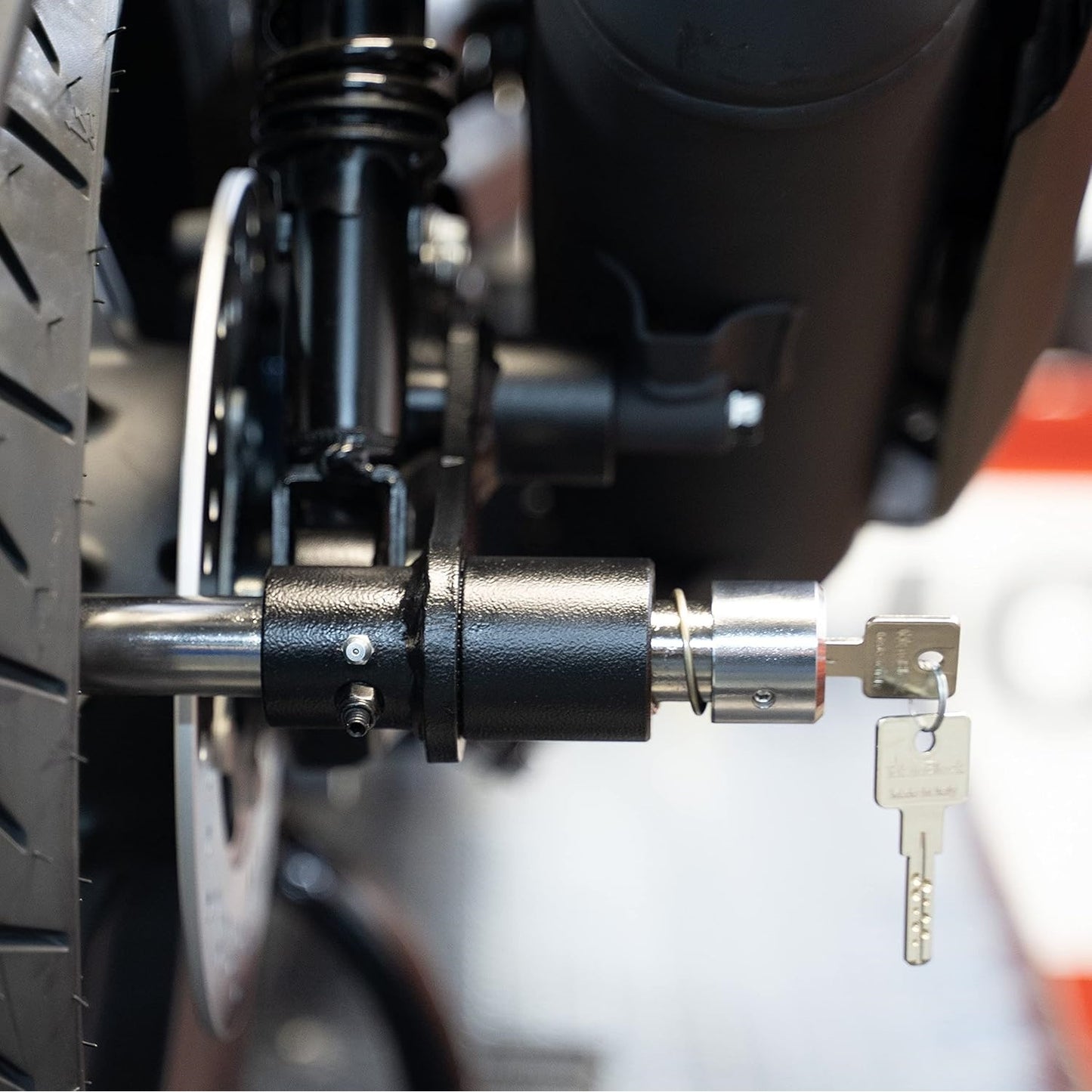 Foot-Activated Motorcycle Lock – Push to Lock, Key to Unlock